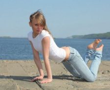 Blonde On All Fours In Jeans