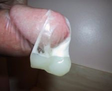 Cock With Condom Full Of Cum