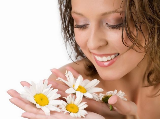 Girl Smiling With Flowers 