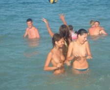 Topless Babes Caught Having Fun In The Water