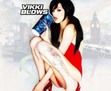Vikki Blows In Red Bikini Having Drink