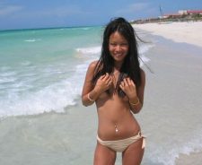 Young Asian Teens At The Beach